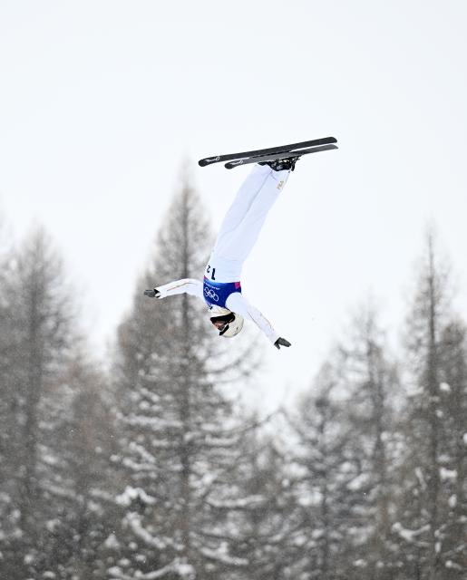 (260221) -- LIVIGNO, Feb. 21, 2026 (Xinhua) -- Wang Xindi of China competes during the freestyle skiing mixed team aerials final 1 at the Milan-Cortina 2026 Olympic Winter Games in Livigno, Italy, Feb. 21, 2026. (Xinhua/Zhang Hongxiang)