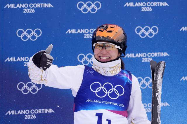 (260221) -- LIVIGNO, Feb. 21, 2026 (Xinhua) -- Xu Mengtao of China reacts during the freestyle skiing mixed team aerials final 2 at the Milan-Cortina 2026 Olympic Winter Games in Livigno, Italy, Feb. 21, 2026. (Xinhua/Hu Chao)