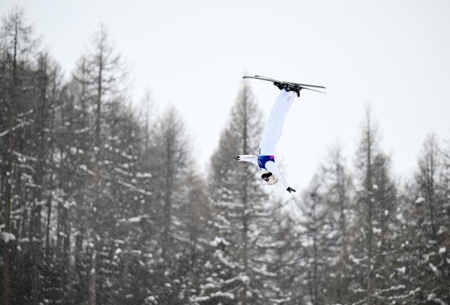 (260221) -- LIVIGNO, Feb. 21, 2026 (Xinhua) -- Wang Xindi of China competes during the freestyle skiing mixed team aerials final 1 at the Milan-Cortina 2026 Olympic Winter Games in Livigno, Italy, Feb. 21, 2026. (Xinhua/Zhang Hongxiang)