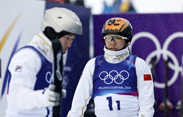 (260221) -- LIVIGNO, Feb. 21, 2026 (Xinhua) -- Xu Mengtao of China reacts during the freestyle skiing mixed team aerials final 2 at the Milan-Cortina 2026 Olympic Winter Games in Livigno, Italy, Feb. 21, 2026. (Xinhua/Wang Peng)
