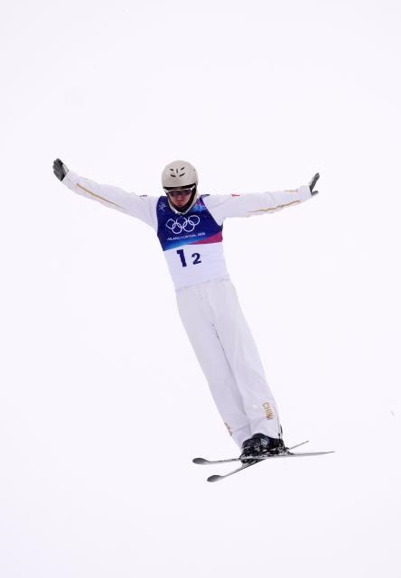 (260221) -- LIVIGNO, Feb. 21, 2026 (Xinhua) -- Wang Xindi of China competes during the freestyle skiing mixed team aerials final 1 at the Milan-Cortina 2026 Olympic Winter Games in Livigno, Italy, Feb. 21, 2026. (Xinhua/Hu Chao)