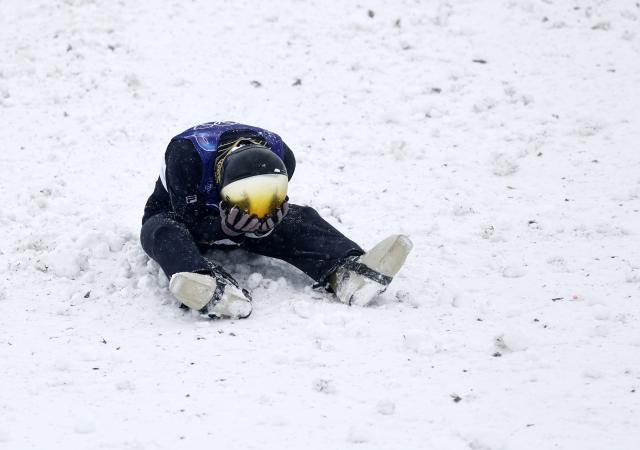 (260221) -- LIVIGNO, Feb. 21, 2026 (Xinhua) -- Li Tianma of China reacts during the freestyle skiing mixed team aerials final 2 at the Milan-Cortina 2026 Olympic Winter Games in Livigno, Italy, Feb. 21, 2026. (Xinhua/Wang Peng)