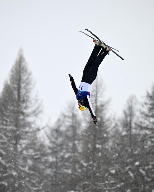 (260221) -- LIVIGNO, Feb. 21, 2026 (Xinhua) -- Li Tianma of China competes during the freestyle skiing mixed team aerials final 2 at the Milan-Cortina 2026 Olympic Winter Games in Livigno, Italy, Feb. 21, 2026. (Xinhua/Zhang Hongxiang)