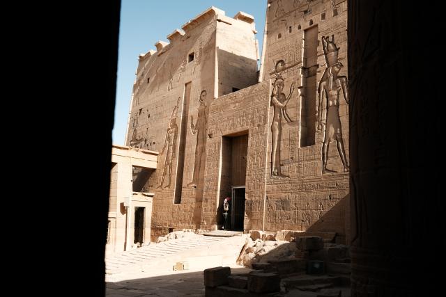 (260221) -- ASWAN, Feb. 21, 2026 (Xinhua) -- A man visits the Philae Temple complex in Aswan, Egypt, Feb. 21, 2026. Built mainly during the Ptolemaic period and dedicated to the goddess Isis, the Philae Temple complex's structures feature floral capitals, hieroglyph-covered walls, and reliefs of ancient deities.
   The temples were submerged because of the construction of Aswan Low Dam in early 1900s and the later construction of Aswan High Dam in the 1960s. And it was relocated, piece by piece, from Philae Island to the higher Agilkia Island decades ago as part of a UNESCO-led campaign to save it from flooding. (Xinhua/Xin Mengchen)
