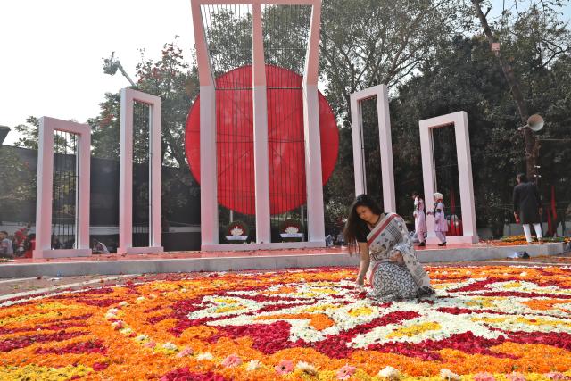 (260221) -- DHAKA, Feb. 21, 2026 (Xinhua) -- People take part in a memorial event observing International Mother Language Day at Central Shaheed Minar in Dhaka, Bangladesh, Feb. 21, 2026. People in Bangladesh's capital, Dhaka, and other parts of the country paid tributes on Saturday to those who sacrificed their lives in the 1952 Language Movement.
   In 1999, UNESCO declared Feb. 21 as International Mother Language Day to promote linguistic and cultural diversity and multilingualism. (Photo by Habibur Rahman/Xinhua)