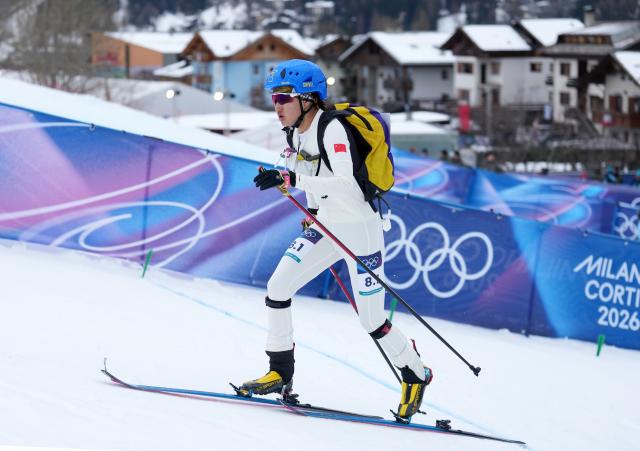 (260221) -- BORMIO, Feb. 21, 2026 (Xinhua) -- Cidan Yuzhen of China competes during the ski mountaineering mixed relay event at the Milan-Cortina 2026 Olympic Winter Games in Bormio, Italy, Feb. 21, 2026. (Xinhua/Hu Huhu)