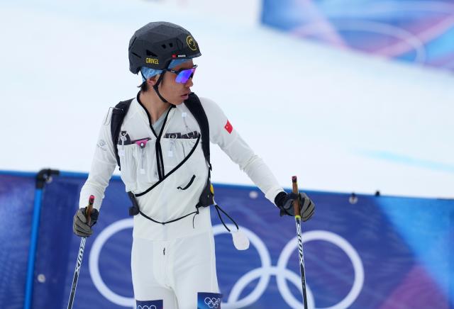 (260221) -- BORMIO, Feb. 21, 2026 (Xinhua) -- Bu Luer of China competes during the ski mountaineering mixed relay event at the Milan-Cortina 2026 Olympic Winter Games in Bormio, Italy, Feb. 21, 2026. (Xinhua/Hu Huhu)