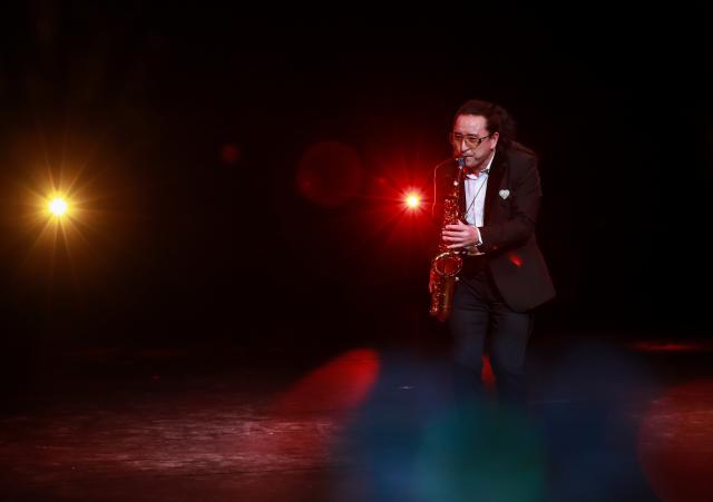 (260221) -- SYDNEY, Feb. 21, 2026 (Xinhua) -- A saxophonist performs during the Lunar New Year Concert 2026 at Sydney Opera House in Sydney, Australia, Feb. 21, 2026. (Xinhua/Ma Ping)