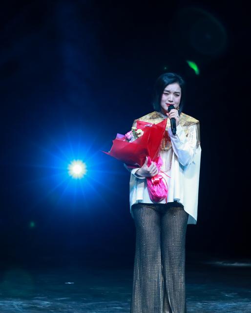 (260221) -- SYDNEY, Feb. 21, 2026 (Xinhua) -- A singer performs during the Lunar New Year Concert 2026 at Sydney Opera House in Sydney, Australia, Feb. 21, 2026. (Xinhua/Ma Ping)