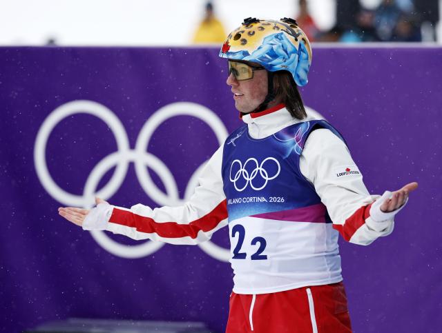 (260221) -- LIVIGNO, Feb. 21, 2026 (Xinhua) -- Miha Fontaine of Canada reacts during the freestyle skiing mixed team aerials final 1 at the Milan-Cortina 2026 Olympic Winter Games in Livigno, Italy, Feb. 21, 2026. (Xinhua/Wang Peng)