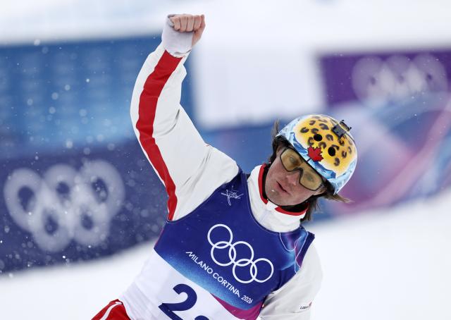 (260221) -- LIVIGNO, Feb. 21, 2026 (Xinhua) -- Miha Fontaine of Canada reacts during the freestyle skiing mixed team aerials final 1 at the Milan-Cortina 2026 Olympic Winter Games in Livigno, Italy, Feb. 21, 2026. (Xinhua/Wang Peng)