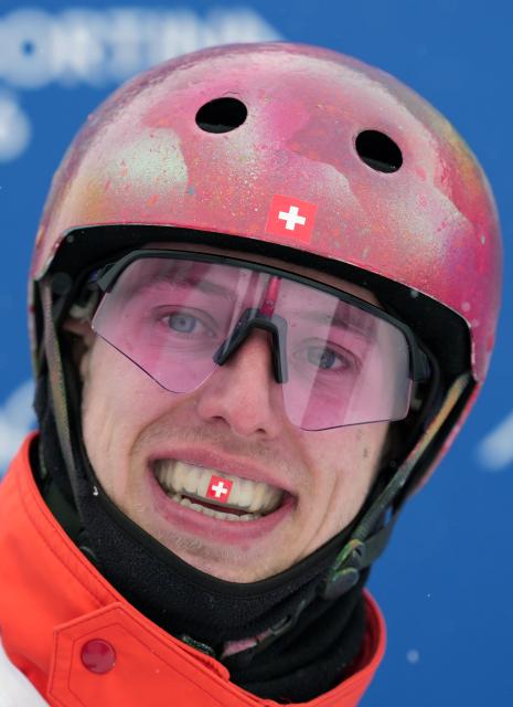 (260221) -- LIVIGNO, Feb. 21, 2026 (Xinhua) -- Pirmin Werner of Switzerland reacts during the freestyle skiing mixed team aerials final 1 at the Milan-Cortina 2026 Olympic Winter Games in Livigno, Italy, Feb. 21, 2026. (Xinhua/Hu Chao)