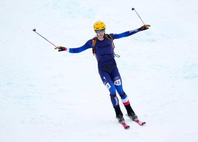 (260221) -- BORMIO, Feb. 21, 2026 (Xinhua) -- Thibault Anselmet of France celebrates winning after finishing the ski mountaineering mixed relay event at the Milan-Cortina 2026 Olympic Winter Games in Bormio, Italy, Feb. 21, 2026. (Xinhua/Hu Huhu)