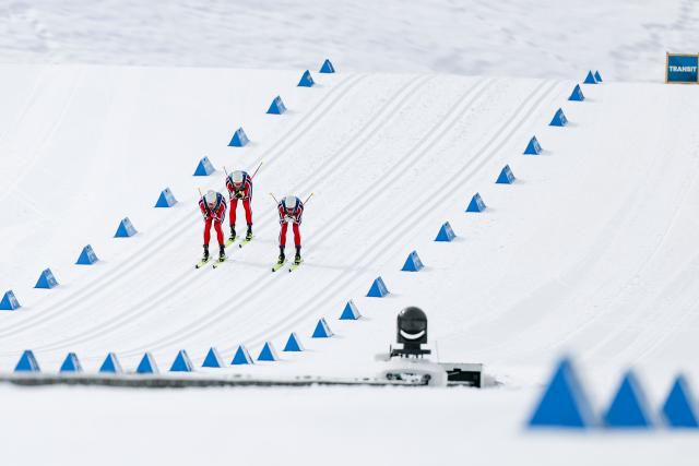 (260221) -- TESERO, Feb. 21, 2026 (Xinhua) -- Johannes Hoesflot Klaebo (L) of Norway and his teammate Emil Iversen of Norway (C) and Martin Loewstroem Nyenget of Norway compete during the cross-country skiing men's 50km mass start classic match at the Milan-Cortina 2026 Olympic Winter Games in Tesero, Italy, Feb. 21, 2026. (Xinhua/Huang Wei)