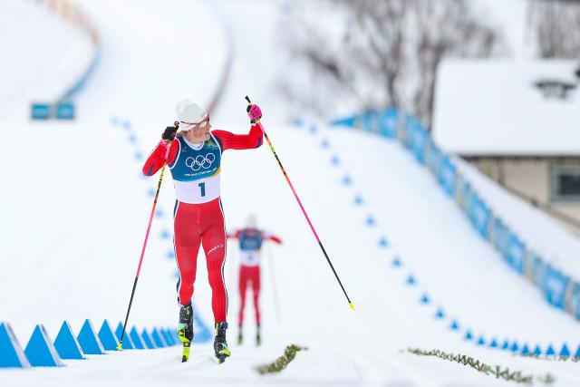 (260221) -- TESERO, Feb. 21, 2026 (Xinhua) -- Johannes Hoesflot Klaebo of Norway sprints toward the finish line during the cross-country skiing men's 50km mass start classic match at the Milan-Cortina 2026 Olympic Winter Games in Tesero, Italy, Feb. 21, 2026. (Xinhua/Huang Wei)