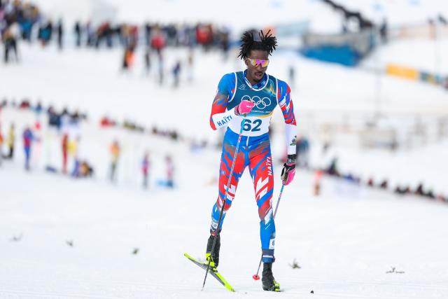 (260221) -- TESERO, Feb. 21, 2026 (Xinhua) -- Savart Stevenson of Haiti competes during the cross-country skiing men's 50km mass start classic match at the Milan-Cortina 2026 Olympic Winter Games in Tesero, Italy, Feb. 21, 2026. (Xinhua/Huang Wei)