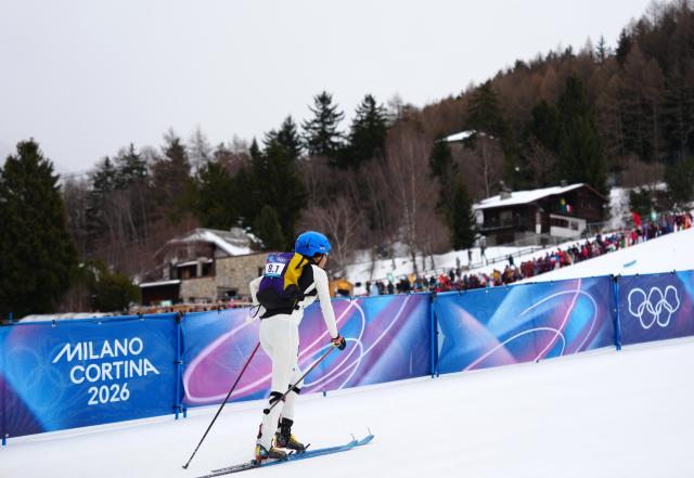 (260221) -- BORMIO, Feb. 21, 2026 (Xinhua) -- Cidan Yuzhen of China competes during the ski mountaineering mixed relay event at the Milan-Cortina 2026 Olympic Winter Games in Bormio, Italy, Feb. 21, 2026. (Xinhua/Yan Linyun)
