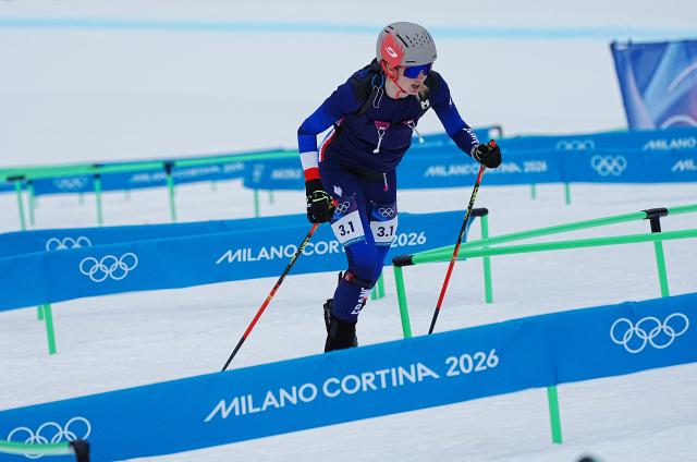 (260221) -- BORMIO, Feb. 21, 2026 (Xinhua) -- Emily Harrop of France competes during the ski mountaineering mixed relay event at the Milan-Cortina 2026 Olympic Winter Games in Bormio, Italy, Feb. 21, 2026. (Xinhua/Yan Linyun)