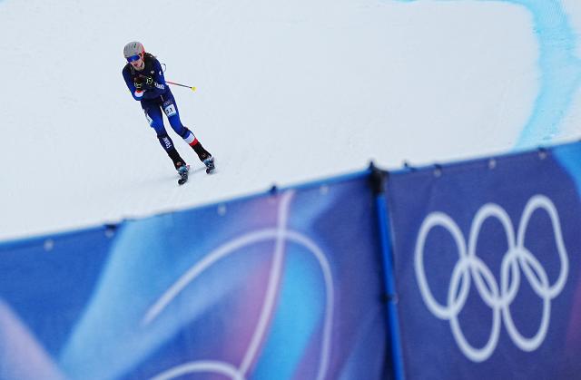 (260221) -- BORMIO, Feb. 21, 2026 (Xinhua) -- Emily Harrop of France competes during the ski mountaineering mixed relay event at the Milan-Cortina 2026 Olympic Winter Games in Bormio, Italy, Feb. 21, 2026. (Xinhua/Yan Linyun)
