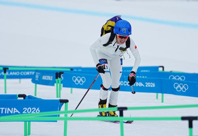 (260221) -- BORMIO, Feb. 21, 2026 (Xinhua) -- Cidan Yuzhen of China competes during the ski mountaineering mixed relay event at the Milan-Cortina 2026 Olympic Winter Games in Bormio, Italy, Feb. 21, 2026. (Xinhua/Yan Linyun)