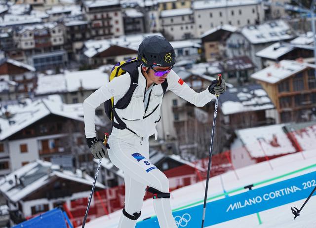 (260221) -- BORMIO, Feb. 21, 2026 (Xinhua) -- Bu Luer of China competes during the ski mountaineering mixed relay event at the Milan-Cortina 2026 Olympic Winter Games in Bormio, Italy, Feb. 21, 2026. (Xinhua/Yan Linyun)