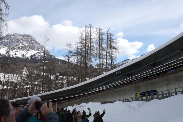 (260221) -- CORTINA D'AMPEZZO, Feb. 21, 2026 (Xinhua) -- Edson Luques Bindilatti/Davidson Henrique de Souza/Rafael Souza da Silva/Luis Bacca Goncalves of Brazil compete during the Bobsleigh 4-man heat 1 at the 2026 Milan-Cortina Winter Olympics in Cortina D'Ampezzo, Italy, Feb. 21, 2026. (Xinhua/Ding Xu)