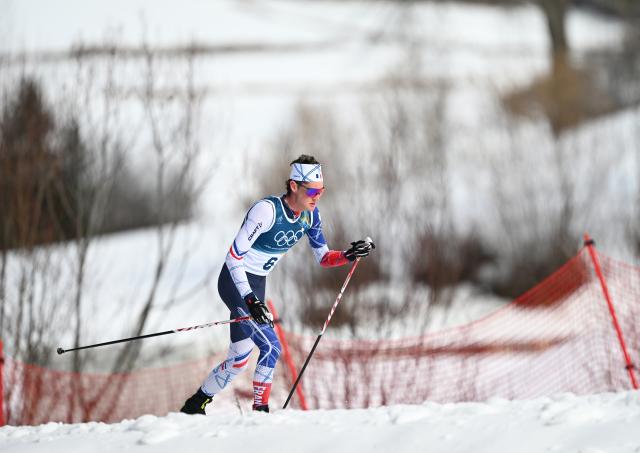(260221) -- TESERO, Feb. 21, 2026 (Xinhua) -- Mathis Desloges of France competes during the cross-country skiing men's 50km mass start classic match at the Milan-Cortina 2026 Olympic Winter Games in Tesero, Italy, Feb. 21, 2026. (Xinhua/He Canling)