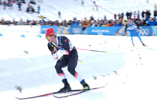 (260221) -- TESERO, Feb. 21, 2026 (Xinhua) -- Li Minglin of China competes during the cross-country skiing men's 50km mass start classic match at the Milan-Cortina 2026 Olympic Winter Games in Tesero, Italy, Feb. 21, 2026. (Xinhua/Meng Yongmin)