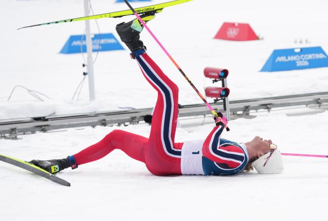 (260221) -- TESERO, Feb. 21, 2026 (Xinhua) -- Johannes Hoesflot Klaebo of Norway reacts after the cross-country skiing men's 50km mass start classic match at the Milan-Cortina 2026 Olympic Winter Games in Tesero, Italy, Feb. 21, 2026. (Xinhua/Meng Yongmin)