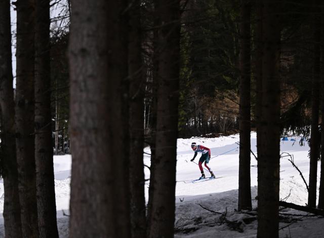 (260221) -- TESERO, Feb. 21, 2026 (Xinhua) -- Adam Buki of Hungary competes during the cross-country skiing men's 50km mass start classic match at the Milan-Cortina 2026 Olympic Winter Games in Tesero, Italy, Feb. 21, 2026. (Xinhua/He Canling)