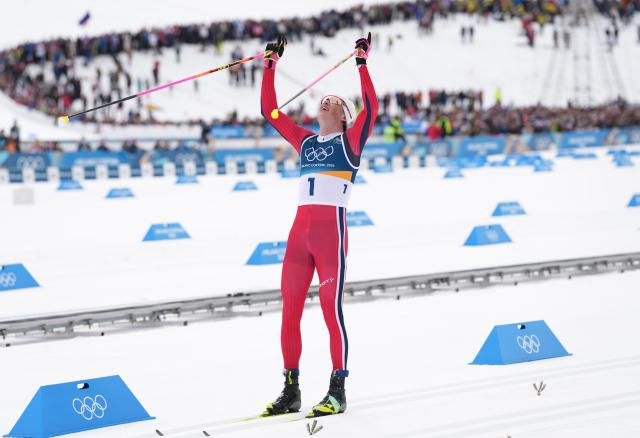 (260221) -- TESERO, Feb. 21, 2026 (Xinhua) -- Johannes Hoesflot Klaebo of Norway celebrates after the cross-country skiing men's 50km mass start classic match at the Milan-Cortina 2026 Olympic Winter Games in Tesero, Italy, Feb. 21, 2026. (Xinhua/Meng Yongmin)