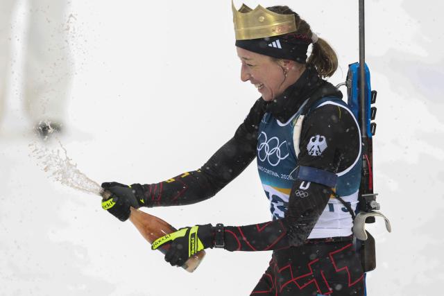 (260221) -- ANTERSELVA, Feb. 21, 2026 (Xinhua) -- Franziska Preuss of Germany celebrates retirement after the biathlon women's 12.5km mass start event at the 2026 Milan-Cortina Winter Olympics in Anterselva, Italy, Feb. 21, 2026. (Xinhua/Zhang Tao)