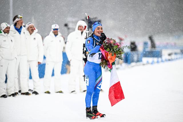 (260221) -- ANTERSELVA, Feb. 21, 2026 (Xinhua) -- Dorothea Wierer of Italy speaks during a retirement ceremony after the biathlon women's 12.5km mass start event at the 2026 Milan-Cortina Winter Olympics in Anterselva, Italy, Feb. 21, 2026. (Xinhua/Jiang Han)