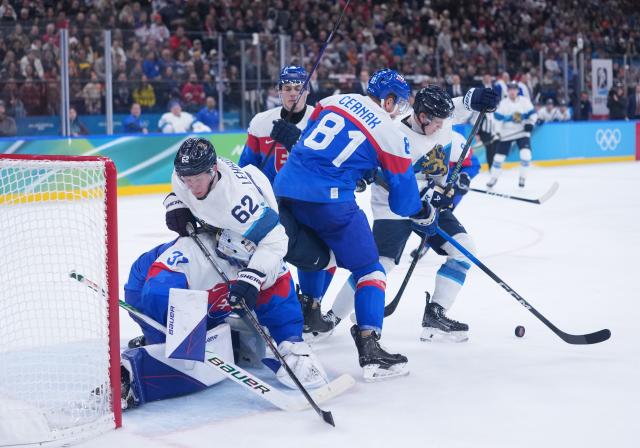 (260221) -- MILAN, Feb. 21, 2026 (Xinhua) -- Artturi Lehkonen (2nd L) of Finland competes during the ice hockey men's bronze medal game between Slovakia and Finland at the Milan-Cortina 2026 Olympic Winter Games in Milan, Italy, Feb. 21, 2026. (Xinhua/Tao Xiyi)