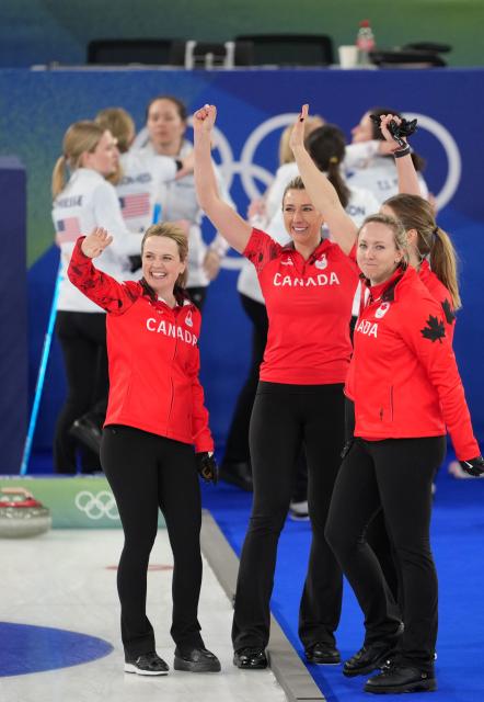 (260221) -- CORTINA D'AMPEZZO, Feb. 21, 2026 (Xinhua) -- Athletes of Canada celebrate after the curling women's bronze medal game between Canada and the United States at the 2026 Milan-Cortina Winter Olympics in Cortina, Italy, Feb. 21, 2026. (Xinhua/Li Gang)