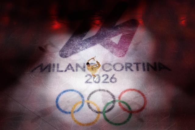 (260222) -- MILAN, Feb. 22, 2026 (Xinhua) -- Adeliia Petrosian of AIN (Individual Neutral Athlete) performs during the gala exhibition of figure skating at the Milan-Cortina 2026 Olympic Winter Games in Milan, Italy, Feb. 21, 2026. (Xinhua/Chen Yichen)
