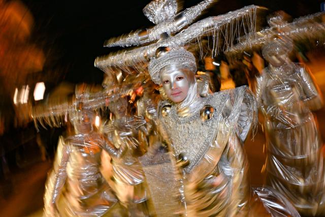 (260222) -- STRUMICA, Feb. 22, 2026 (Xinhua) -- Costumed revelers perform in an evening carnival in Strumica, North Macedonia, Feb. 21, 2026. (Photo by Tomislav Georgiev/Xinhua)