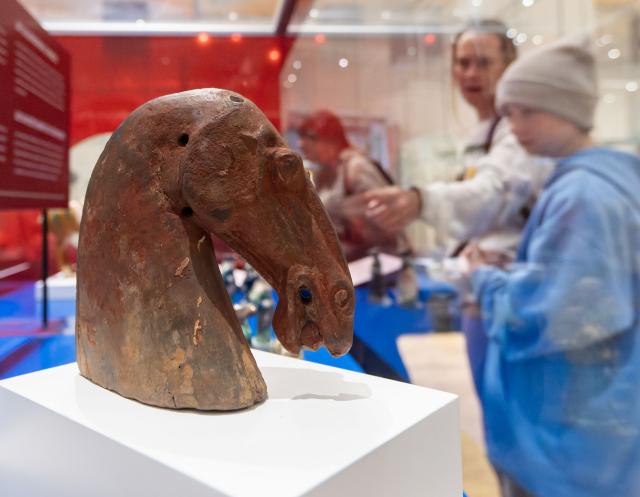 (260222) -- TORONTO, Feb. 22, 2026 (Xinhua) -- Visitors view an exhibit of the Year of the Horse from the Chinese Zodiac Case exhibition at the Royal Ontario Museum in Toronto, Canada, on Feb. 21, 2026. Featuring a rich collection of horse-themed objects and cultural artifacts, this annual Chinese zodiac exhibition opened here on Feb. 10 and will last until Jan. 31, 2027. (Photo by Zou Zheng/Xinhua)