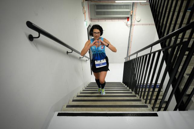 (260222) -- WARSAW, Feb. 22, 2026 (Xinhua) -- A participant climbs the stairs inside the Skyliner building during the Skyliner Everest Run 2026 in Warsaw, Poland on Feb. 21, 2026. The event requires competitors to ascend the 42-floor staircase 55 times within 24 hours, reaching a cumulative height equivalent to the world's highest peak, Mount Qomolangma. (Photo by Jaap Arriens/Xinhua)