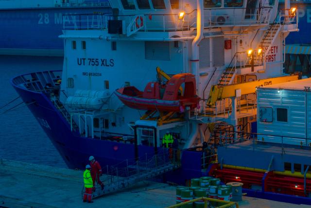 (260222) -- BAKU, Feb. 22, 2026 (Xinhua) -- Staff members replenish supplies to a vessel at the Baku Shipyard in Baku, Azerbaijan, Feb. 10, 2026. TO GO WITH "Feature: 'Caspian' Spring Festival for Chinese oil explorers supporting Azerbaijan's energy exploration" (Xinhua/Chen Junfeng)