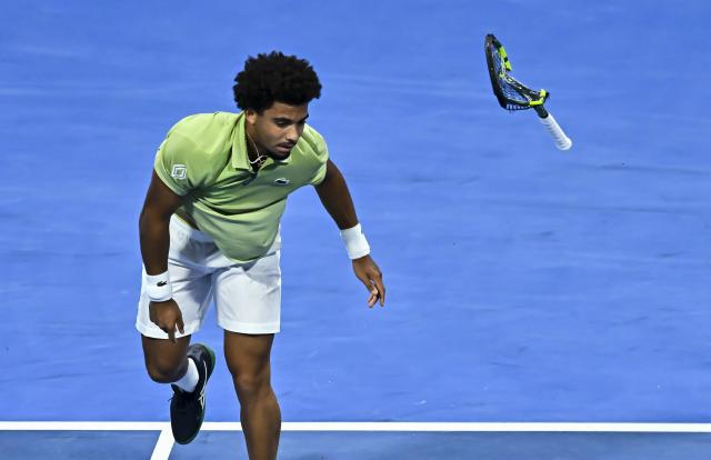 (260222) -- DOHA, Feb. 22, 2026 (Xinhua) -- Arthur Fils reacts during the men's singles final match between Carlos Alcaraz of Spain and Arthur Fils of France at the ATP Qatar Open 2026 tennis tournament final in Doha, Qatar, on Feb. 21, 2026. (Photo by Nikku/Xinhua)