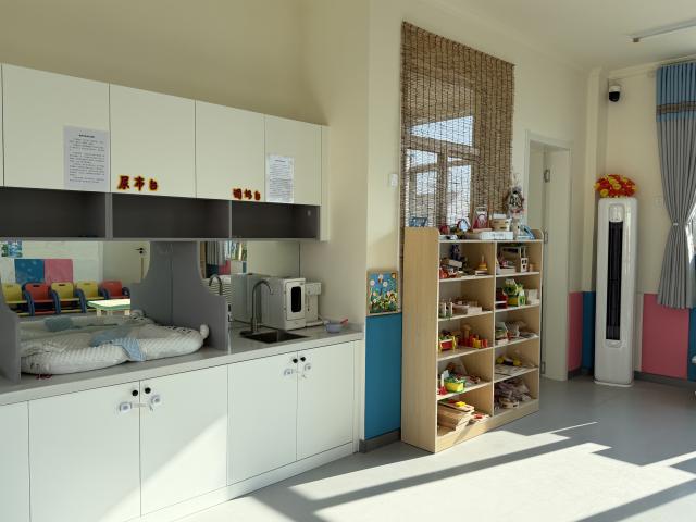 (260222) -- QINGDAO, Feb. 22, 2026 (Xinhua) -- This photo taken on Dec. 30, 2025 shows an interior view of the Kangbei Childcare Center in Lyujia Village of Cuijiaji Town, Qingdao, east China's Shandong Province. TO GO WITH "China Focus: Cradle next to a greenhouse: China brings daycare to the fields" (Xinhua/Zhang Liyuan)