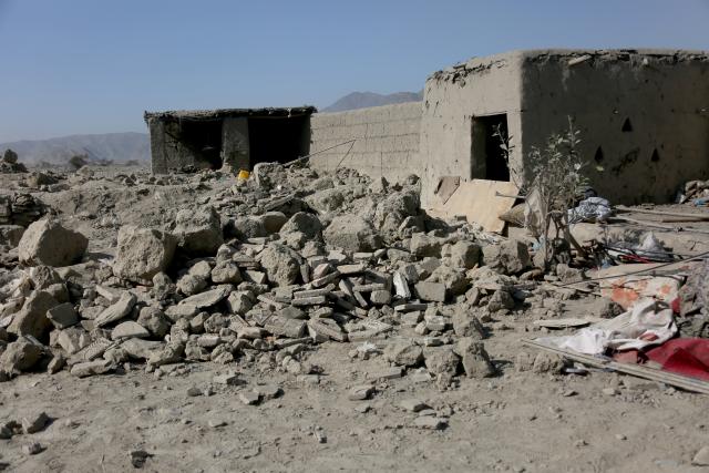 (260222) -- NANGARHAR, Feb. 22, 2026 (Xinhua) -- Debris is seen around damaged buildings after an airstrike in Afghanistan's Nangarhar Province, on Feb. 22, 2026. Zabihullah Mujahid, spokesperson for the Afghan government, confirmed on X on Sunday that the Pakistani military had once again carried out airstrikes on border areas between Afghanistan and Pakistan, causing dozens of casualties. (Photo by Saifurahman Safi/Xinhua)