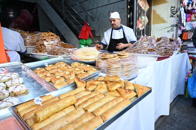 (260222) -- RABAT, Feb. 22, 2026 (Xinhua) -- A vendor sells traditional Moroccan pastries at a market during the Muslim holy month of Ramadan in Rabat, Morocco, on Feb. 21, 2026. (Photo by Aissa/Xinhua)