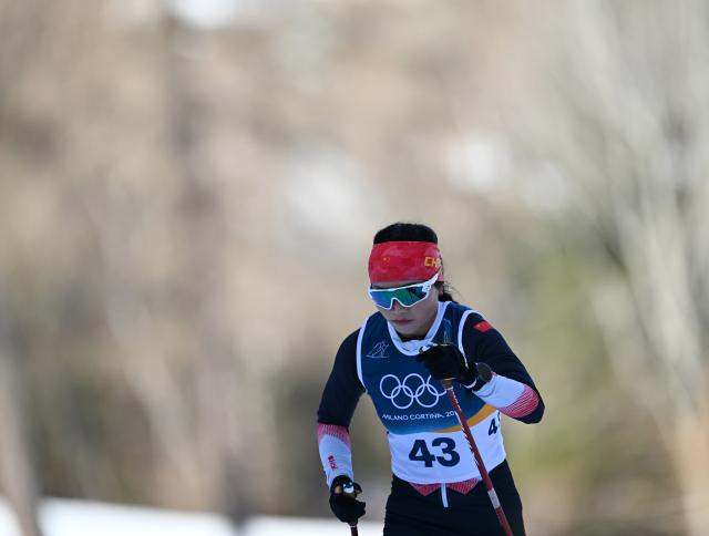 (260222) -- TESERO, Feb. 22, 2026 (Xinhua) -- Wang Yundi of China competes during the cross-country skiing women's 50km mass start classic match at the Milan-Cortina 2026 Olympic Winter Games in Tesero, Italy, Feb. 22, 2026. (Xinhua/He Canling)
