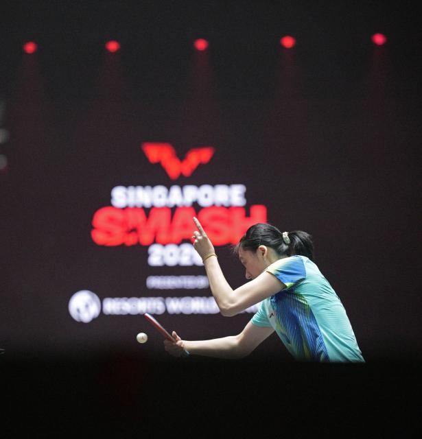 (260222) -- SINGAPORE, Feb. 22, 2026 (Xinhua) -- Chen Yi hits a return during the women's singles round of 64 match between Chen Yi of China and Sofia Polcanova of Austria at the World Table Tennis (WTT) Singapore Smash 2026 in Singapore on Feb. 22, 2026. (Photo by Then Chih Wey/Xinhua)
