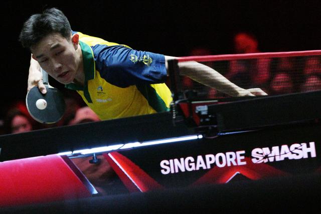 (260222) -- SINGAPORE, Feb. 22, 2026 (Xinhua) -- Finn Luu serves during the men's singles round of 64 match between Wang Chuqin of China and Finn Luu of Australia at the World Table Tennis (WTT) Singapore Smash 2026 in Singapore on Feb. 22, 2026. (Photo by Then Chih Wey/Xinhua)