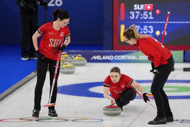 (260222) -- CORTINA D'AMPEZZO, Feb. 22, 2026 (Xinhua) -- Selina Witschonke (C) of Switzerland delivers a stone during the curling women's gold medal game between Switzerland and Sweden at the 2026 Milan-Cortina Winter Olympics in Cortina, Italy, Feb. 22, 2026. (Xinhua/Li Gang)