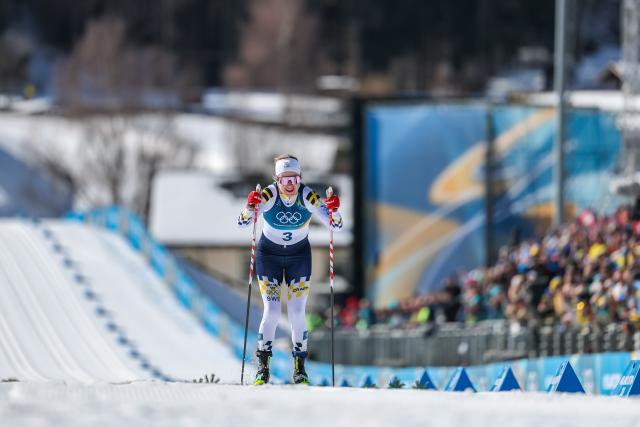 (260222) -- TESERO, Feb. 22, 2026 (Xinhua) -- Ebba Andersson of Sweden sprints to the finish line during the cross-country skiing women's 50km mass start classic match at the Milan-Cortina 2026 Olympic Winter Games in Tesero, Italy, Feb. 22, 2026. (Xinhua/Huang Wei)