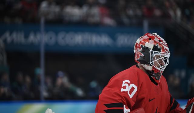 (260222) -- MILAN, Feb. 22, 2026 (Xinhua) -- Goalkeeper Jordan Binnington of Canada competes during the ice hockey men's gold medal game between Canada and the United States at the Milan-Cortina 2026 Olympic Winter Games in Milan, Italy, Feb. 22, 2026. (Xinhua/Zhang Haofu)